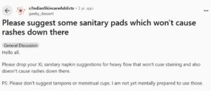 Reddit post in r/IndianSkincareAddicts where a user requests XL sanitary pad suggestions that prevent staining and rashes, clarifying they are not ready to use tampons or menstrual cups.