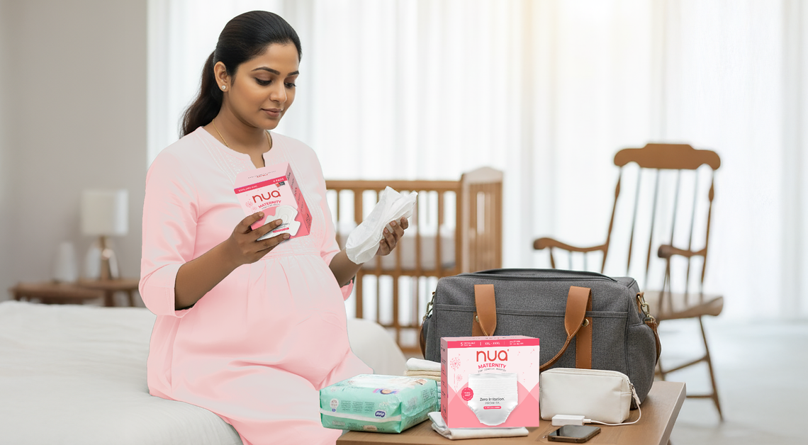 Pregnant woman packing Nua maternity pads into her hospital bag, preparing for postpartum care.