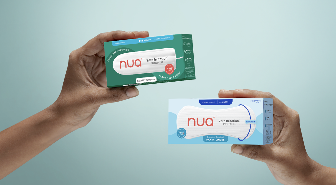 Hands holding Nua tampons and panty liners, both labeled Zero Irritation Promise against a blue background.