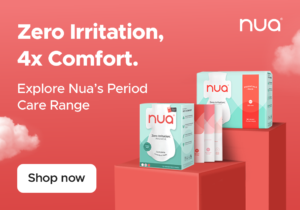 Promotional banner on a coral background displaying Nua period pad boxes placed on elevated blocks. Text reads ‘Zero Irritation, 4x Comfort. Explore Nua’s Period Care Range.’ with a ‘Shop now’ button.